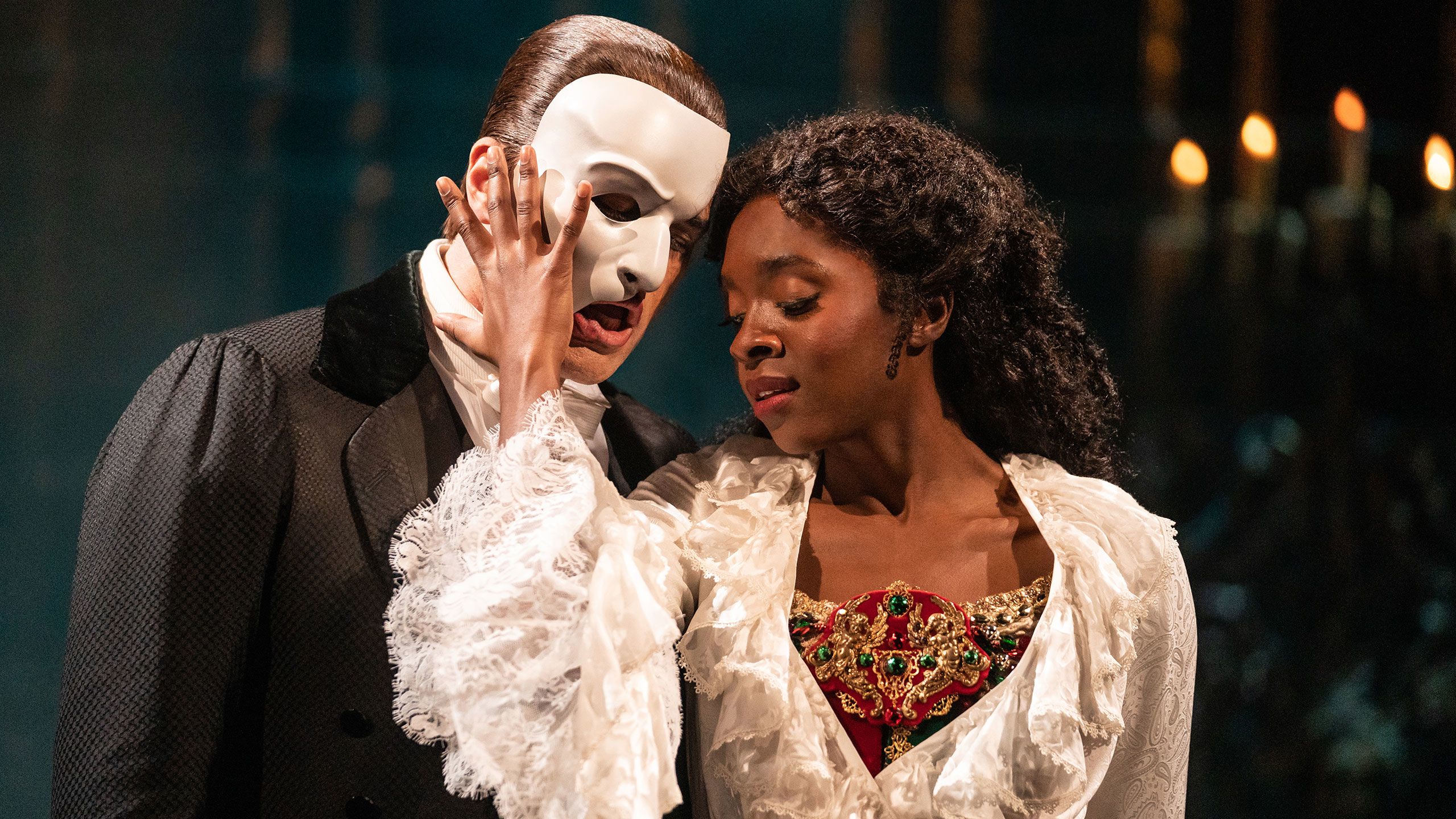 Ben Crawford as The Phantom and Emilie Kouatchou as Christine by Matthew Murphy